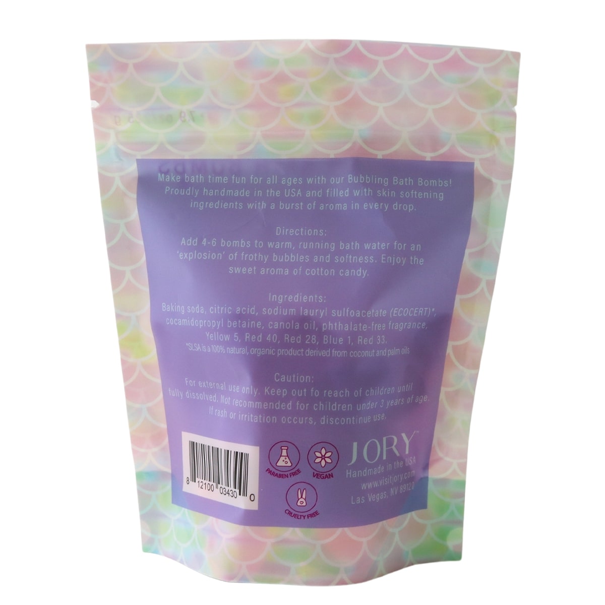 Back of a bath bomb packaging with colorful mermaid scale pattern and text.