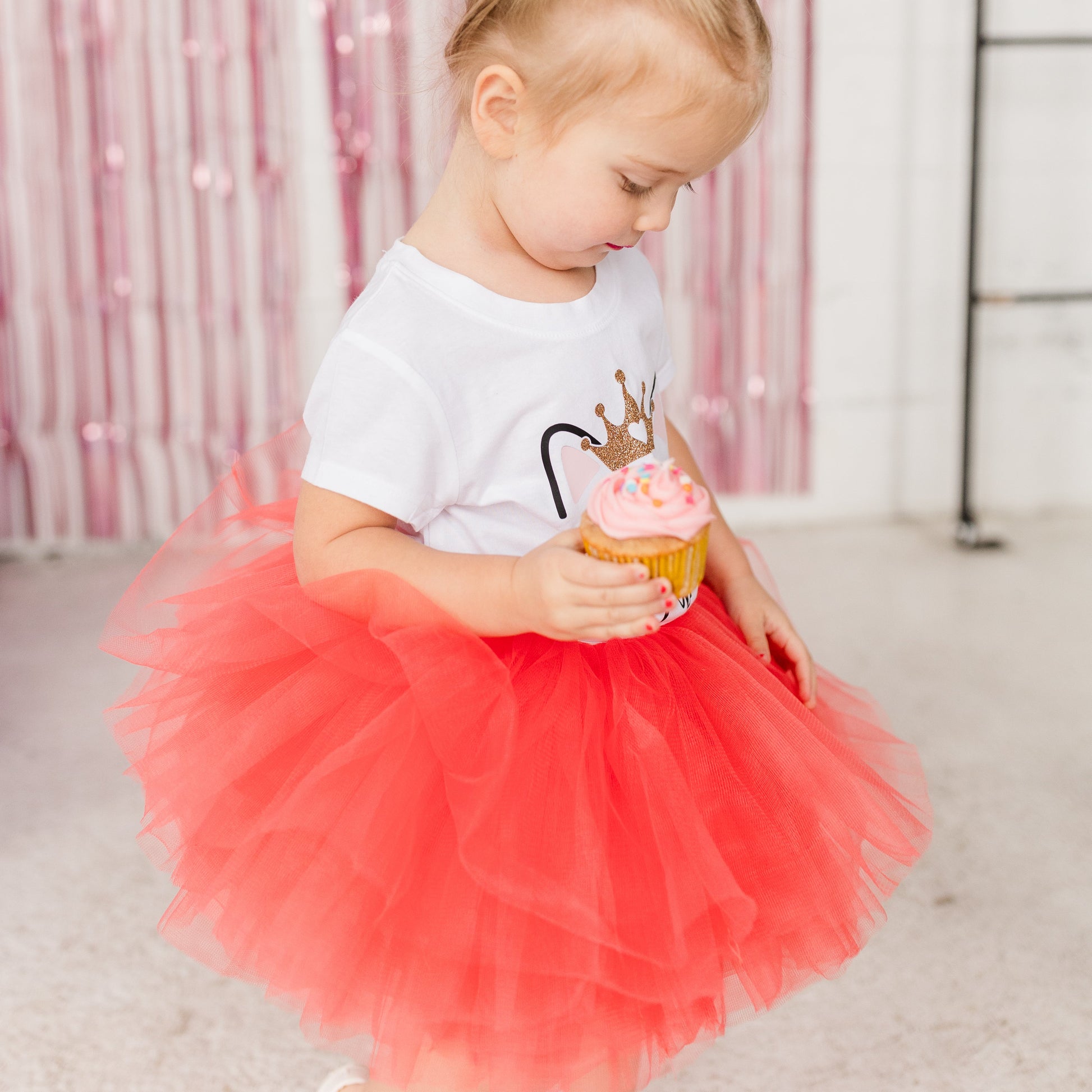 Full Layered Toddler and Young Girl Coral Tutu Skirt is a perfect addition to any littles one wardrobe. Our Coral color is the perfect sunset orange pink. Pair with your magical outfits or birthday celebration outfit.