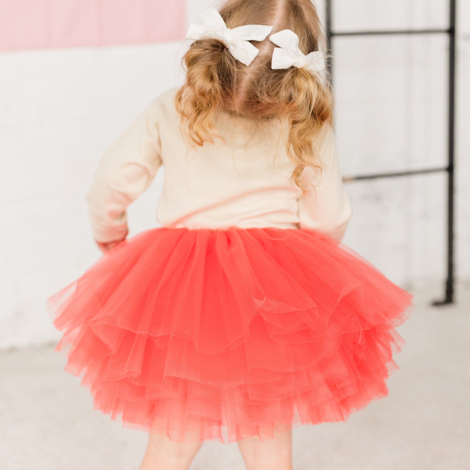 Full Layered Toddler and Young Girl Coral Tutu Skirt is a perfect addition to any littles one wardrobe. Our Coral color is the perfect sunset orange pink. Pair with your magical outfits or birthday celebration outfit.