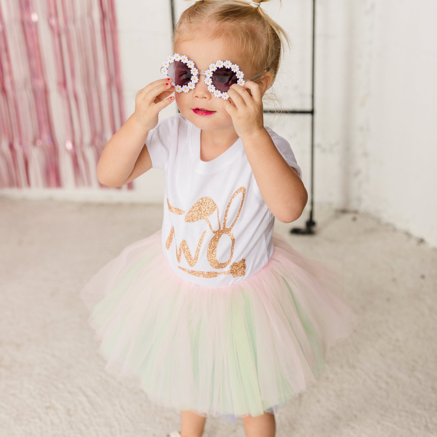 Our ten layered Pastel Rainbow tutu is a perfect addition to anyones wardrobe.  The soft pastel pink, green, purple, blue and white goes with many spring outfits! The fluffy bunny cottontail is removable for a easy transitional piece.