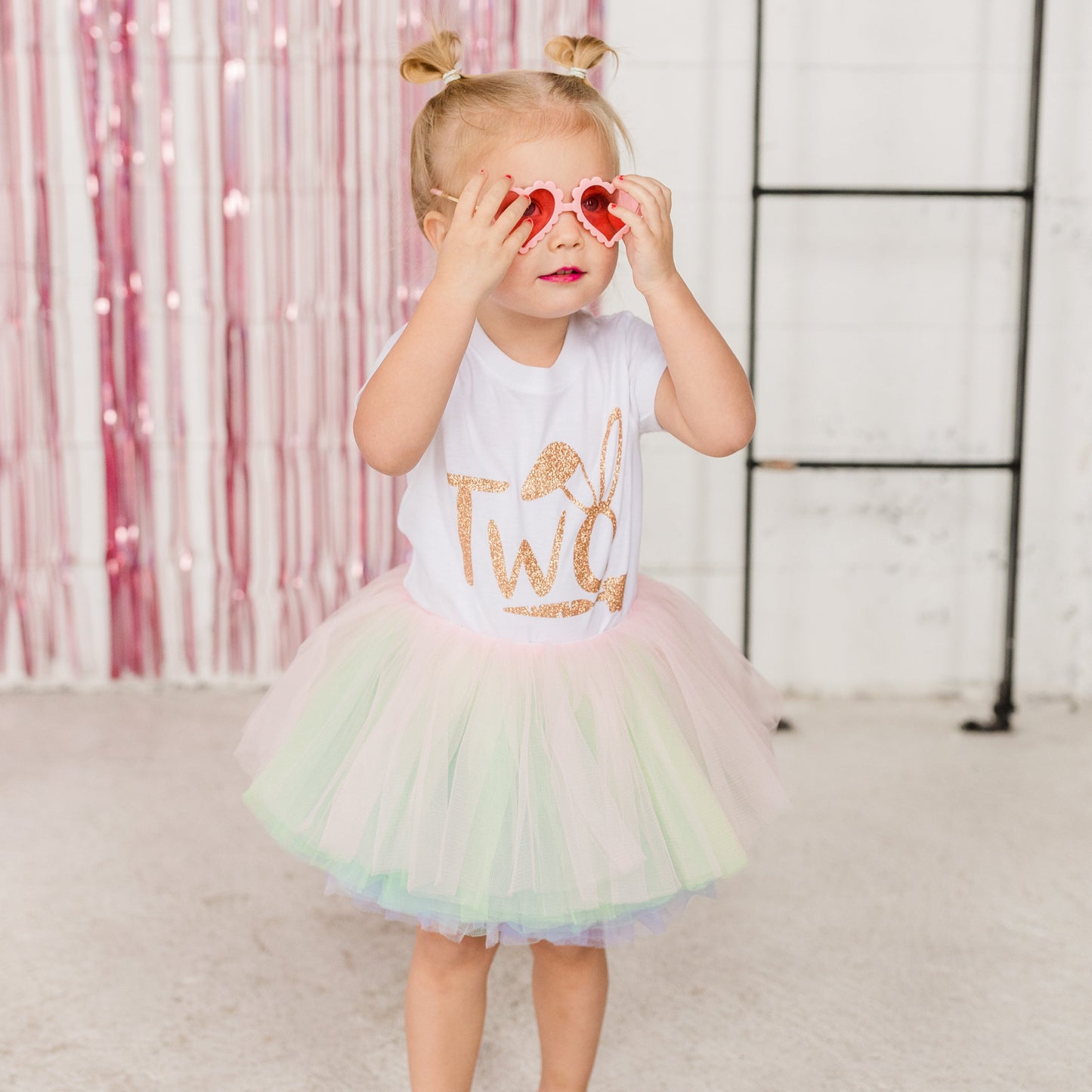 Our ten layered Pastel Rainbow tutu is a perfect addition to anyones wardrobe.  The soft pastel pink, green, purple, blue and white goes with many spring outfits! The fluffy bunny cottontail is removable for a easy transitional piece.