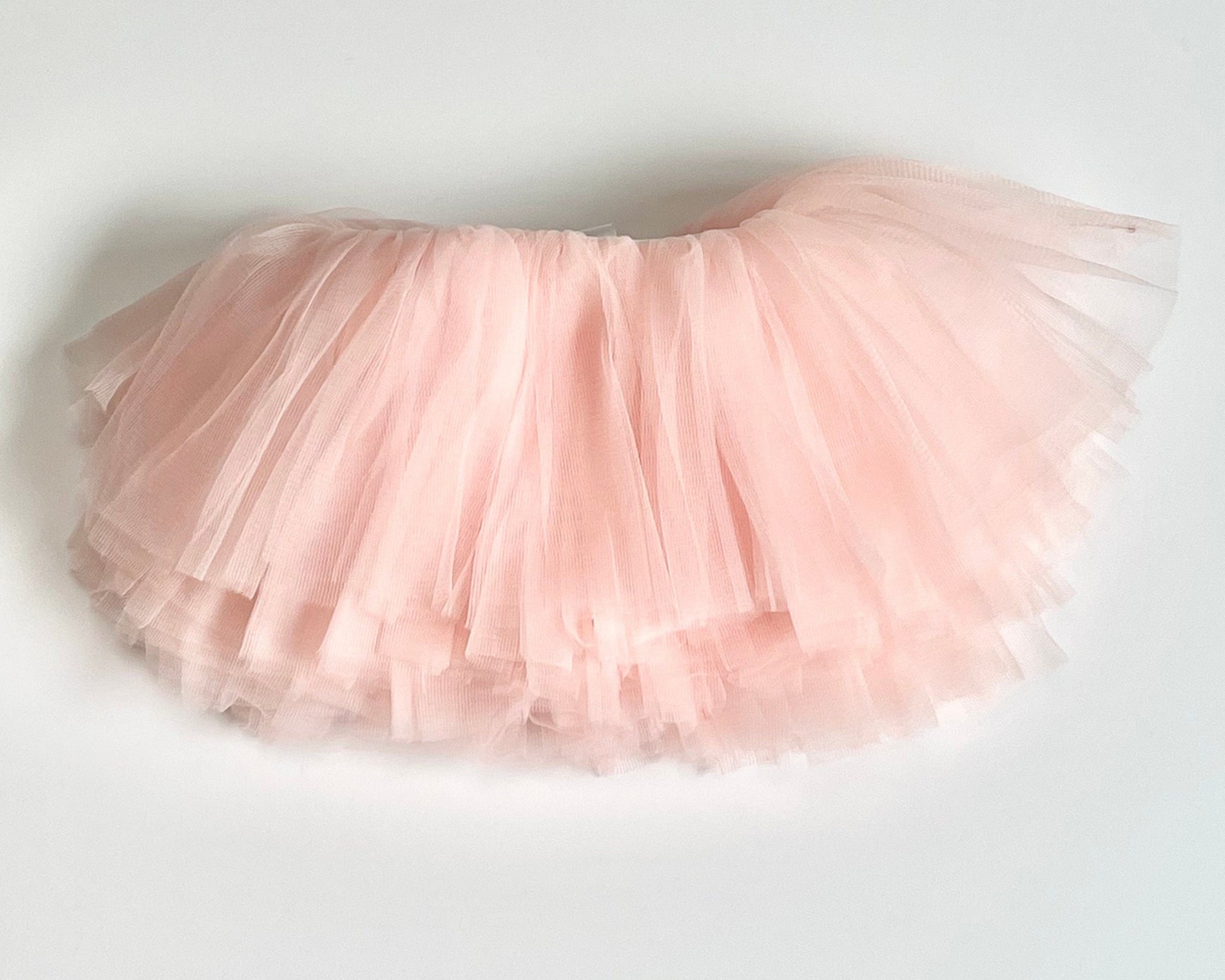 Our Dusty Mauve Organic cotton lightweight long sleeve sweatshirt with a floral bunny pairs perfect with our blush peach pink tutu. Wear together as a set or seperate for multiple options! This outfit is perfect for a spring day, Easter Sunday, or that special occasion you want your toddler or little girl to look her best!