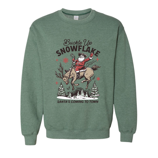 Green sweatshirt with Christmas-themed graphic and text on a white background