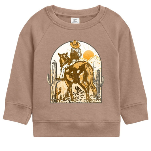 Brown organic cotton kids long sleeve light weight sweatshirt with desert  rider graphic of cowgirl on horseback with cactus and sunset.