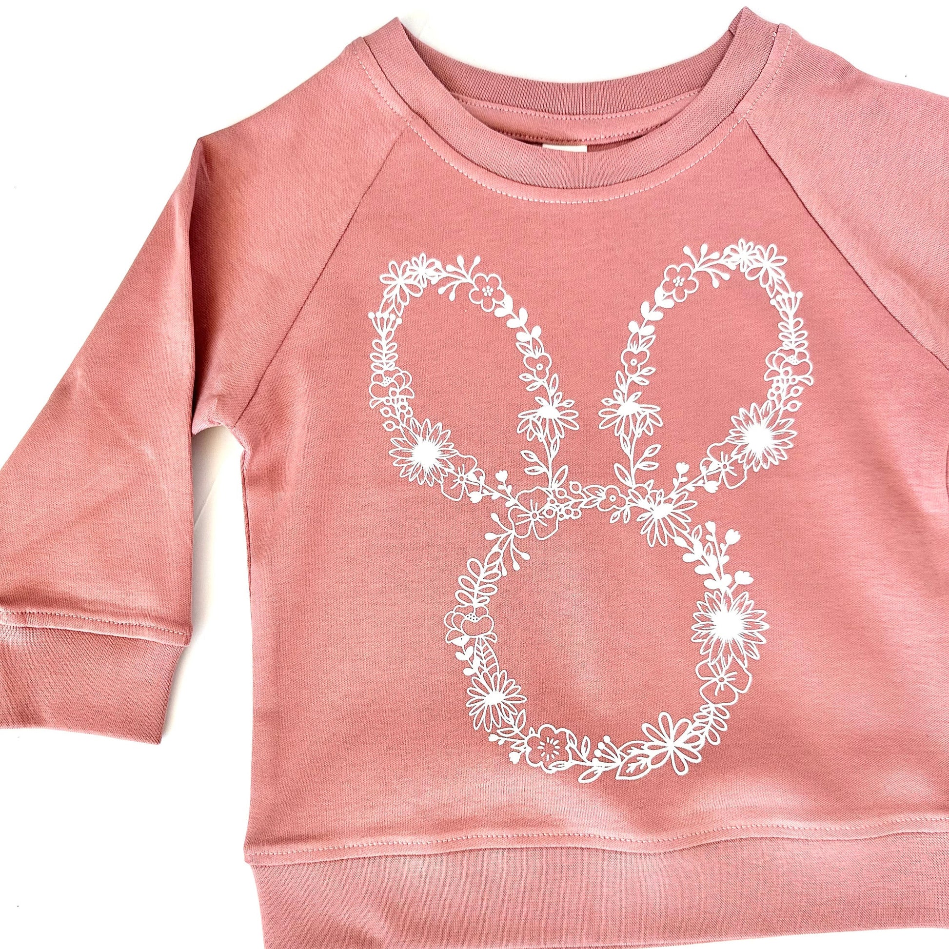 Our Dusty Mauve Organic cotton lightweight long sleeve sweatshirt with a floral bunny pairs perfect with our blush peach pink tutu. Wear together as a set or seperate for multiple options! This outfit is perfect for a spring day, Easter Sunday, or that special occasion you want your toddler or little girl to look her best!