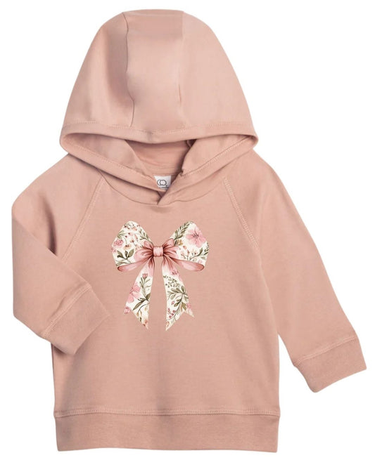 Pink organic cotton kids hoodie with floral bow graphic on front.