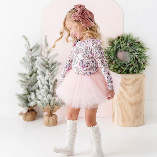 The perfect blush tutu does exist! The soft peachy pink hues ads for the perfect addition to your little ones wardrobe. This tutu matches so many shades of pink.