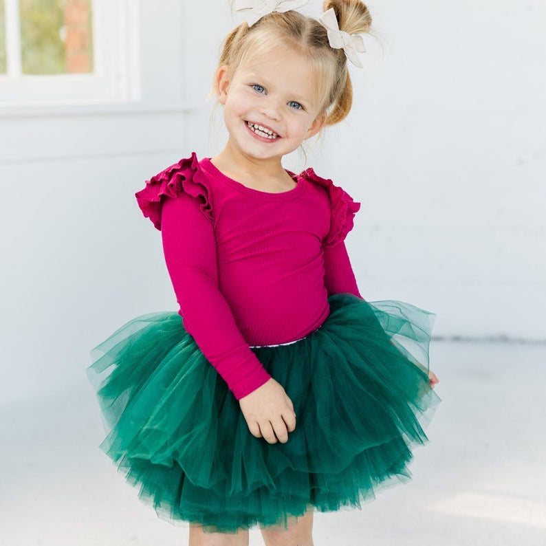 Our Hunter Green Christmas tutu skirt is a perfect addition to your little ones closet! Glam up any outfit with our boutique high grade tulle. Our tulle is the softest with your little ones sensitive skin in mind. Wearable for all day, your little one will be twirling around in no time!