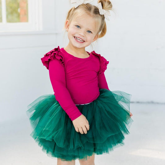 Our Hunter Green Christmas tutu skirt is a perfect addition to your little ones closet! Glam up any outfit with our boutique high grade tulle. Our tulle is the softest with your little ones sensitive skin in mind. Wearable for all day, your little one will be twirling around in no time!