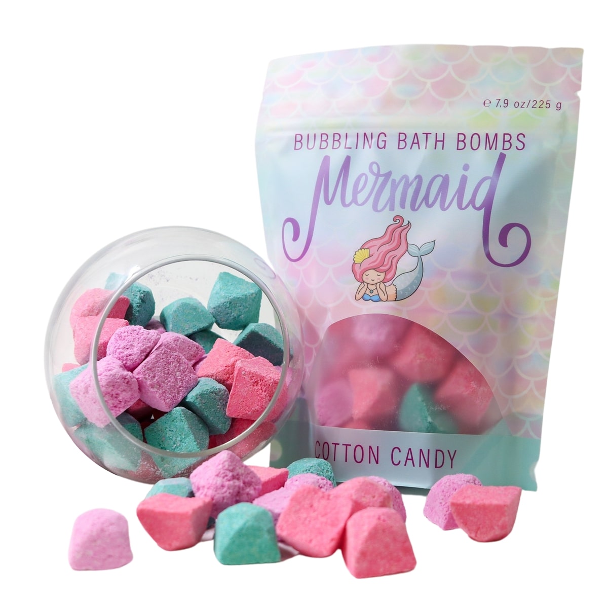 Bubbling bath bombs in pink and blue with a 'Mermaid' branded packaging on a white background.