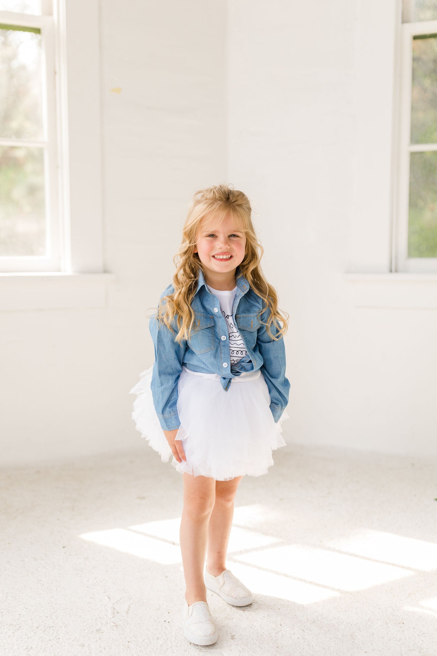 Light up the room with this White tutu! Made with layers of soft, high-quality tulle, this tutu adds a playful pop of color to any outfit. Whether you're planning a photoshoot, attending a party, or looking for the perfect accessory for a themed event, this tutu is sure to make a statement. Our waistband is a comfortable  fit. With the full layers, our tutus are twirl-worthy! 