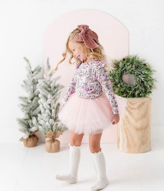 The perfect blush tutu does exist! The soft peachy pink hues ads for the perfect addition to your little ones wardrobe. This tutu matches so many shades of pink. 