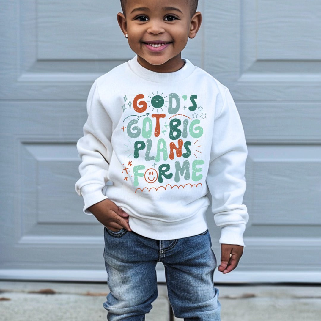 Wrap your toddler in warmth and style with our adorable Faith Collection “God has Big Plans for Me” crew neck sweatshirt or T-Shirt—an essential addition to their wardrobe. Designed with both comfort and fashion in mind, this sweatshirt is perfect for school, playtime, nap time, and everything in between.
