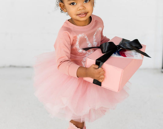 Our Ombre Mauve Pink Tutu paired with our floral bunny print on an organic cotton lightweight sweatshirt makes for a perfect addition to any little ones' wardrobe.  This charming outfit is perfect for birthdays, spring events, or wear for Easter. The rich shades of mauve pinks are perfect to wear to gather or separately. 